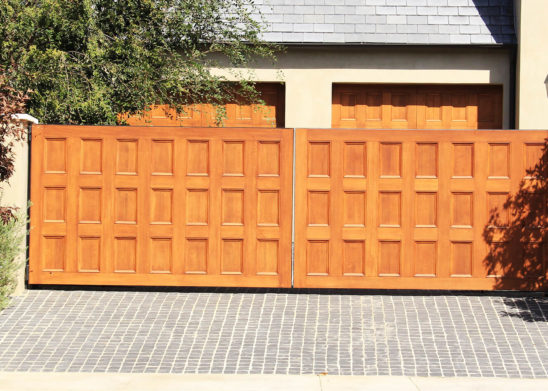 custom finished wood dual slide auto gates